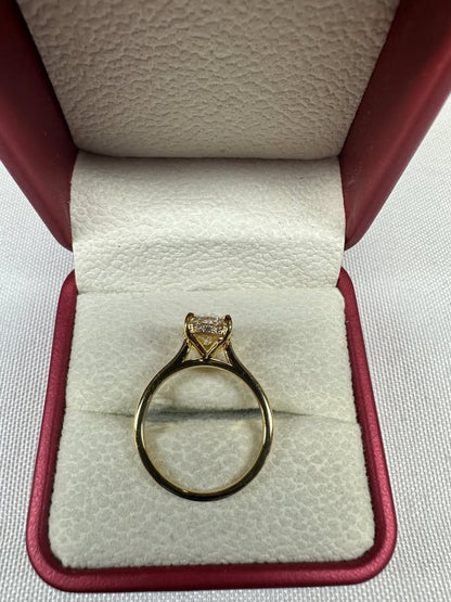 Oval hidden halo ring, 2ct, 14K yellow gold — top view