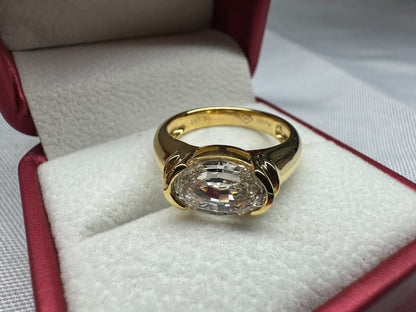 Oval step cut east-west ring, 2.53ct, 14K yellow gold — top view