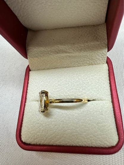 Oval brilliant solitaire ring, 2.6ct, 14K yellow gold — side view