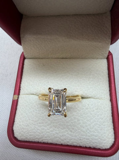 Emerald cut tulip prong solitaire ring, 2.1ct, 14K yellow gold