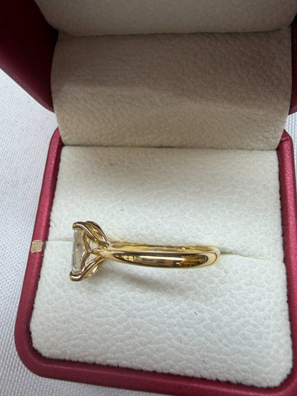 Emerald cut tulip prong ring, side view