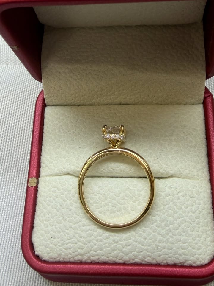 Emerald cut hidden halo ring, top view
