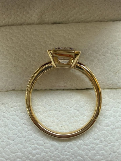 Emerald cut bezel ring, top view