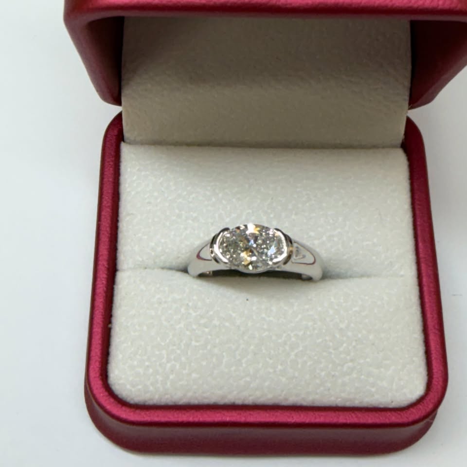 Oval east-west half-bezel ring, 1.5ct, 14K white gold